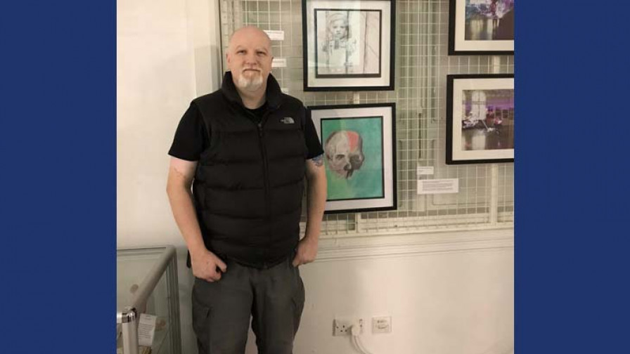 Pete with his own artwork